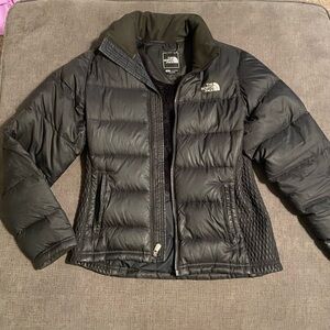 The North Face women’s black puffer coat